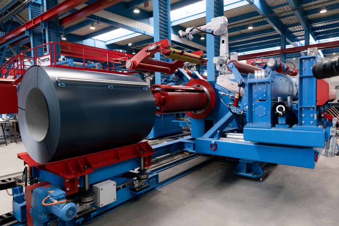 Elevated view of an automated coil farm and roller door production line