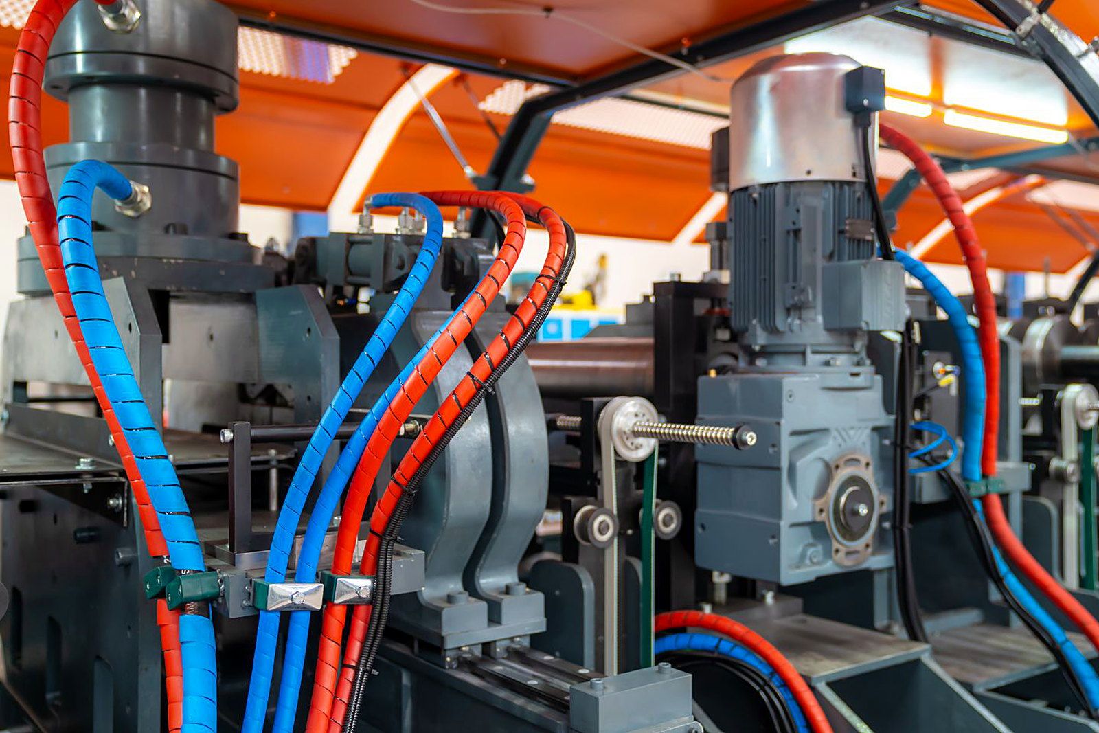 Servo drives and cable looms on an automated roll-forming line